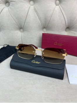 Солнцезащитные очки Cartier с деревянными дужками со вставками золота и коричневыми стеклами